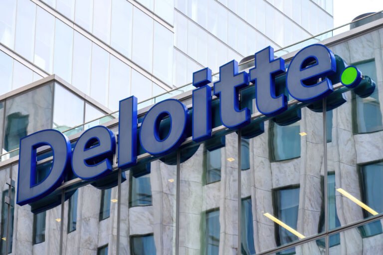 Deloitte logo or sign on a modern building facade